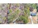 Expansive property featuring a home nestled among lush trees at 4751 Bill Cheek Rd, Auburn, GA 30011