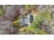 Aerial view of a wooded property featuring a single-Gathering home at 4751 Bill Cheek Rd, Auburn, GA 30011