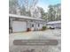 Spacious garage or workshop, ready for your business or hobby dreams with ample parking at 4751 Bill Cheek Rd, Auburn, GA 30011