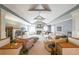 Spacious living room with fireplace and tray ceilings at 4751 Bill Cheek Rd, Auburn, GA 30011