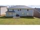 Large backyard with patio provides ample space for relaxation and recreation at 7178 Cavender Sw Dr, Atlanta, GA 30331
