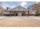 Community clubhouse featuring a grand facade and ample parking at 7178 Cavender Sw Dr, Atlanta, GA 30331