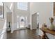 Welcoming foyer with wood flooring, high ceilings, and great natural light at 7178 Cavender Sw Dr, Atlanta, GA 30331