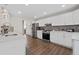 Well-equipped kitchen with stainless steel appliances, white cabinets, and ample counter space at 7178 Cavender Sw Dr, Atlanta, GA 30331
