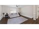 Cozy living room with wood floors, a ceiling fan, and a comfortable couch at 7178 Cavender Sw Dr, Atlanta, GA 30331