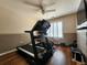 Exercise room with a treadmill, stationary bike, and workout bench at 2702 Brookefield Nw Ln, Kennesaw, GA 30152