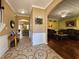 Welcoming foyer featuring decorative tile flooring, archways, and views into the living room and kitchen area at 2702 Brookefield Nw Ln, Kennesaw, GA 30152