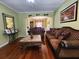 Cozy living room with hardwood floors, decorative details, and comfortable seating, perfect for relaxation and gatherings at 2702 Brookefield Nw Ln, Kennesaw, GA 30152