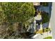 An overhead view showcases the house, driveway, street, and surrounding trees, highlighting the property layout at 633 N Fairfield Dr, Peachtree City, GA 30269
