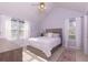 Inviting bedroom with ample natural light and neutral décor, offering a relaxing retreat at 633 N Fairfield Dr, Peachtree City, GA 30269
