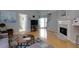 Spacious living room showing the entryway, stairs, and fireplace at 633 N Fairfield Dr, Peachtree City, GA 30269