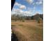 View of a large, grassy backyard showcasing the property's outdoor space at 1027 Goza Rd, Fayetteville, GA 30215