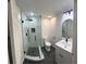 Modern bathroom with a glass-enclosed shower, vanity, and contemporary fixtures at 1027 Goza Rd, Fayetteville, GA 30215