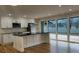 Modern kitchen with stainless steel appliances and breakfast bar at 1027 Goza Rd, Fayetteville, GA 30215