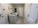 Functional laundry room with washer, dryer, and storage space at 1027 Goza Rd, Fayetteville, GA 30215