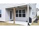Covered back porch featuring an outdoor ceiling fan and a grill at 1116 Heatherland Dr, Marietta, GA 30066