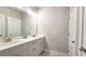 Double sink bathroom with a large mirror and plenty of cabinet space at 1116 Heatherland Dr, Marietta, GA 30066