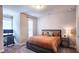 Cozy bedroom with neutral walls, carpeting, and lots of natural light at 1116 Heatherland Dr, Marietta, GA 30066