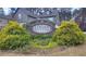Logan Park community sign surrounded by lush landscaping at 1116 Heatherland Dr, Marietta, GA 30066