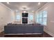 Spacious living room with a fireplace, built-in cabinets, and a comfortable gray sectional sofa at 1116 Heatherland Dr, Marietta, GA 30066
