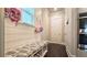 Mudroom with storage bench, hooks, and natural light at 1116 Heatherland Dr, Marietta, GA 30066