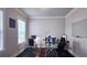 Bright office space with two desks, comfortable chairs, and natural light from large windows at 1116 Heatherland Dr, Marietta, GA 30066