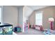 Spacious playroom with ample natural light and room for a variety of activities at 1116 Heatherland Dr, Marietta, GA 30066