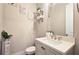 Charming powder room with a modern vanity and decorative accents at 1116 Heatherland Dr, Marietta, GA 30066