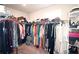 Walk-in closet providing ample space for clothing and accessories at 1116 Heatherland Dr, Marietta, GA 30066