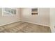 Neutral bedroom with carpet, two windows, and a clean, minimalist aesthetic, ready for personal touches at 1702 Danrich Dr, Decatur, GA 30032
