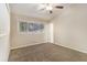 Bedroom with neutral walls, carpet flooring and window with blinds at 1702 Danrich Dr, Decatur, GA 30032