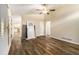 Neutral living room featuring wood-look floors, high ceiling and open floor plan at 1702 Danrich Dr, Decatur, GA 30032