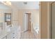 Bright bathroom features double sinks, a separate tub, and neutral tiles at 313 Sable Trace Pass, Acworth, GA 30102