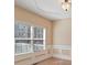 Dining room features neutral paint and trim and large windows for ample sunlight at 313 Sable Trace Pass, Acworth, GA 30102