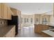Bright kitchen features stainless steel appliances, breakfast area, and ample counter space at 313 Sable Trace Pass, Acworth, GA 30102