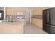 Spacious kitchen featuring stainless steel appliances, wood cabinets, and tile backsplash, blending style and function at 313 Sable Trace Pass, Acworth, GA 30102