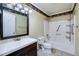 Bathroom with vanity, toilet, shower, and tub combination at 115 Heritage Cir, Mcdonough, GA 30253