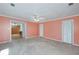 This bright bedroom boasts a seamless connection to other spaces and is complete with ample closet space at 115 Heritage Cir, Mcdonough, GA 30253