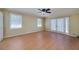 Bright, spacious bedroom features ample natural light and a ceiling fan at 115 Heritage Cir, Mcdonough, GA 30253
