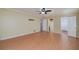 Large bedroom with hardwood floors, walk-in closet, and en-suite bathroom at 115 Heritage Cir, Mcdonough, GA 30253
