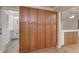 Spacious kitchen features ample storage with beautiful wood cabinetry and light countertops at 115 Heritage Cir, Mcdonough, GA 30253