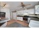 Bright kitchen with white cabinets, stainless steel appliances, and countertop space at 115 Heritage Cir, Mcdonough, GA 30253