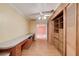 Bright Office space including built-in cabinets, a desk, and hardwood floors at 115 Heritage Cir, Mcdonough, GA 30253
