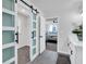 Bathroom with sliding doors to closet and view into bedroom at 1785 Hammond Woods Sw Cir, Marietta, GA 30008