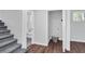 Hallway with access to bathroom, laundry, and stairs at 1785 Hammond Woods Sw Cir, Marietta, GA 30008