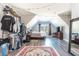 Bright bedroom featuring a window, hardwood floors, and walk in closet with ample space at 201 Edwards Brook Ct, Canton, GA 30115