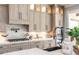 Modern kitchen featuring sleek countertops, custom cabinetry, and stainless steel appliances at 201 Edwards Brook Ct, Canton, GA 30115