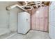 Unfinished basement featuring a refrigerator and exposed utilities, ready to be personalized at 3550 Gravitt Rd, Cumming, GA 30040