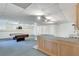 Finished basement features a kitchenette, providing additional functionality and entertainment space at 3550 Gravitt Rd, Cumming, GA 30040