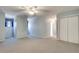 Spacious bedroom with neutral carpet, updated paint and windows letting in natural light at 3550 Gravitt Rd, Cumming, GA 30040